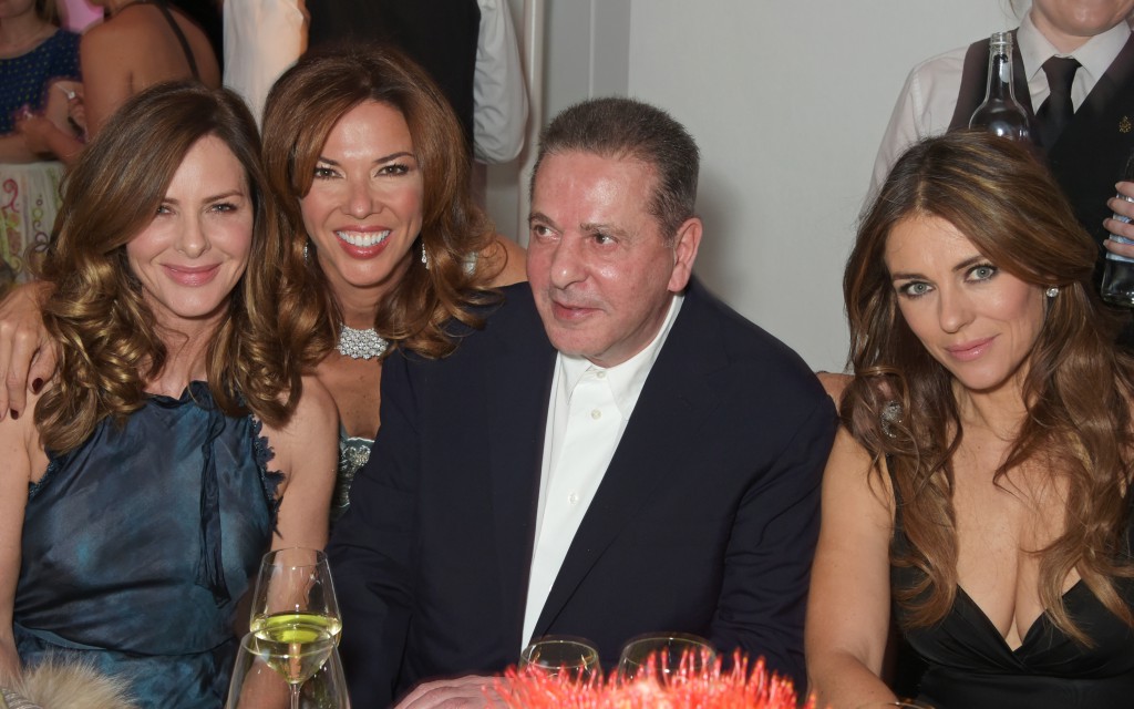 LONDON, ENGLAND - MAY 12:  (L to R) Trinny Woodall, Heather Kerzner, Charles Saatchi and Elizabeth Hurley attend the Spring Gala In Aid of the Red Cross War Memorial Children's Hospital hosted by QBF and Kerzner Calliva at Claridge's Hotel on May 12, 2015 in London, England.   Pic Credit: Dave Benett