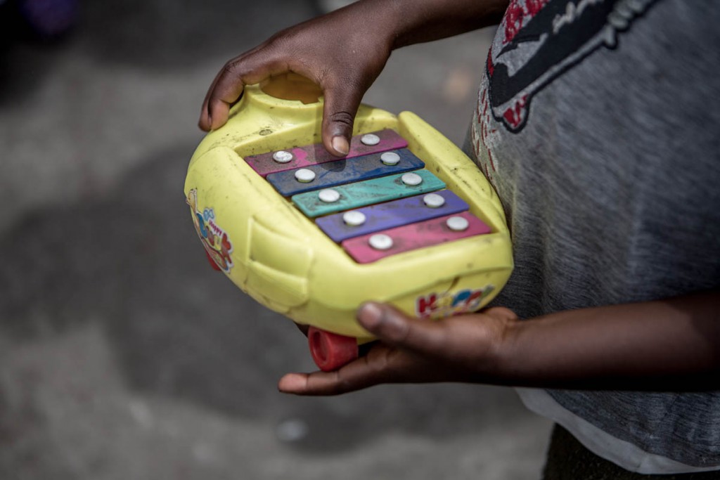 Forgotten toys inside their family home, in a severely impoverished small informal settlement in Grabouw, Western Cape.